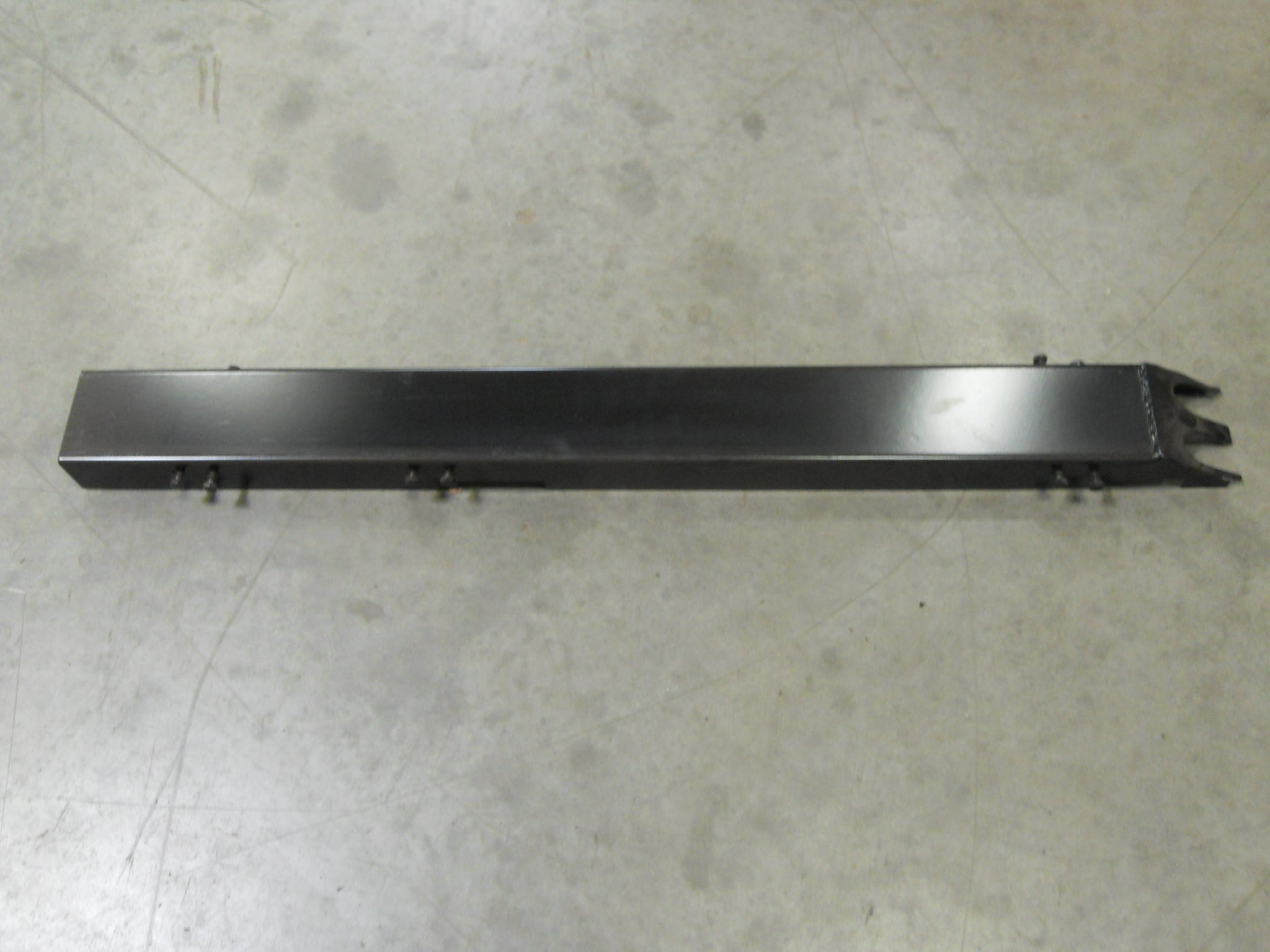 TOP GUARD RH LOADER ARM