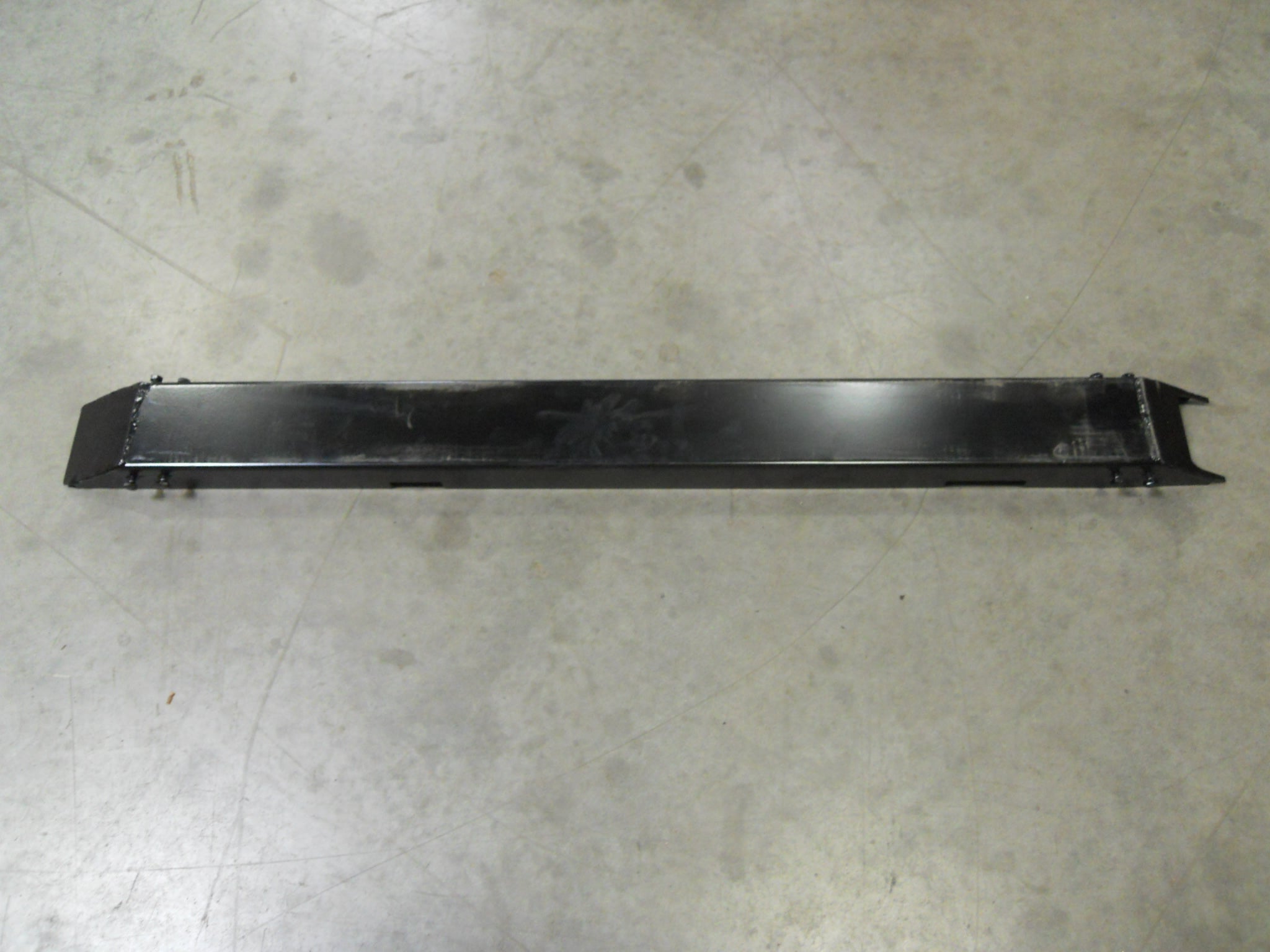 TOP GUARD LH LOADER ARM