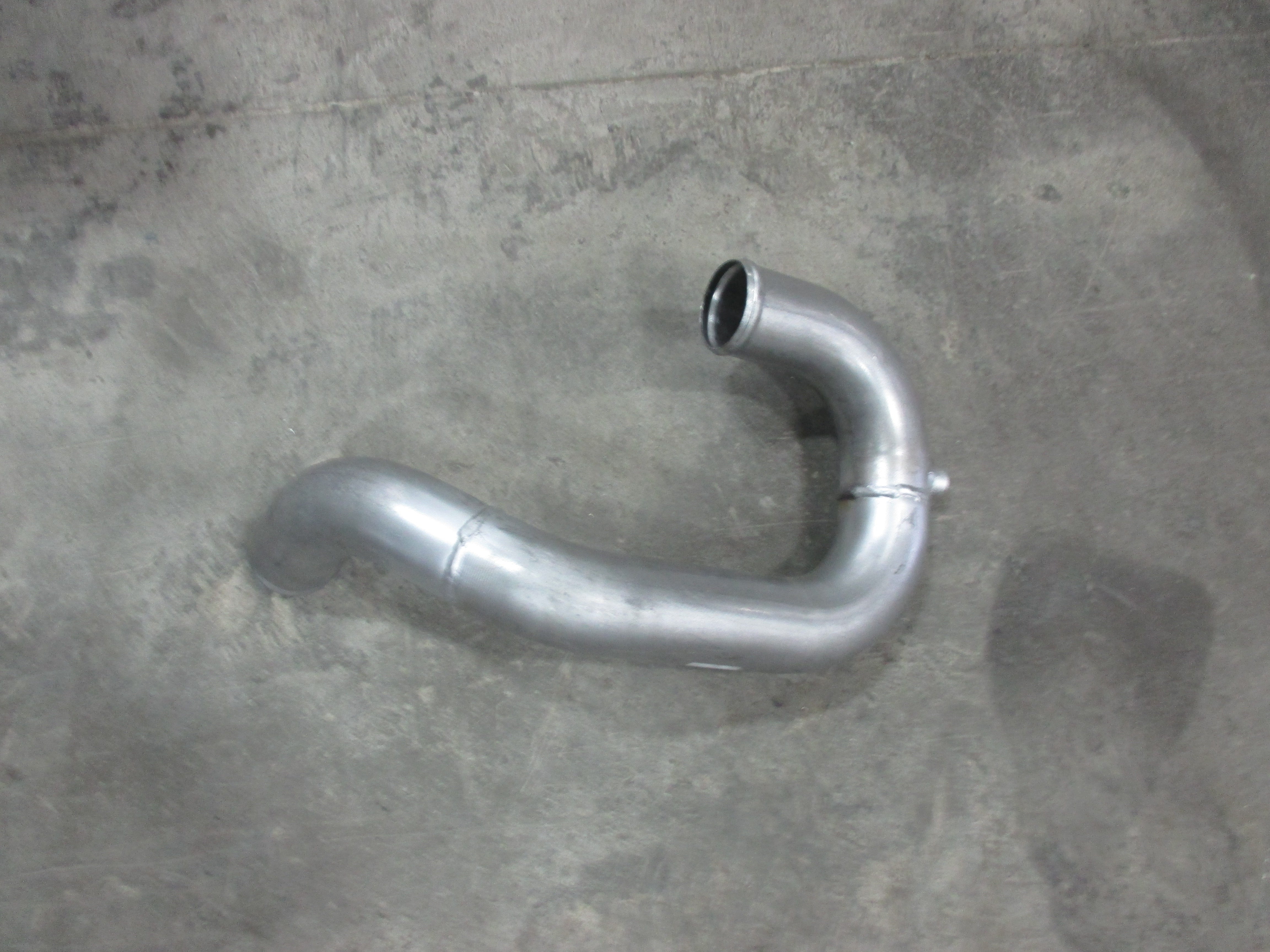 TUBE, 2 1/4" OD, RADIATOR OUTLET