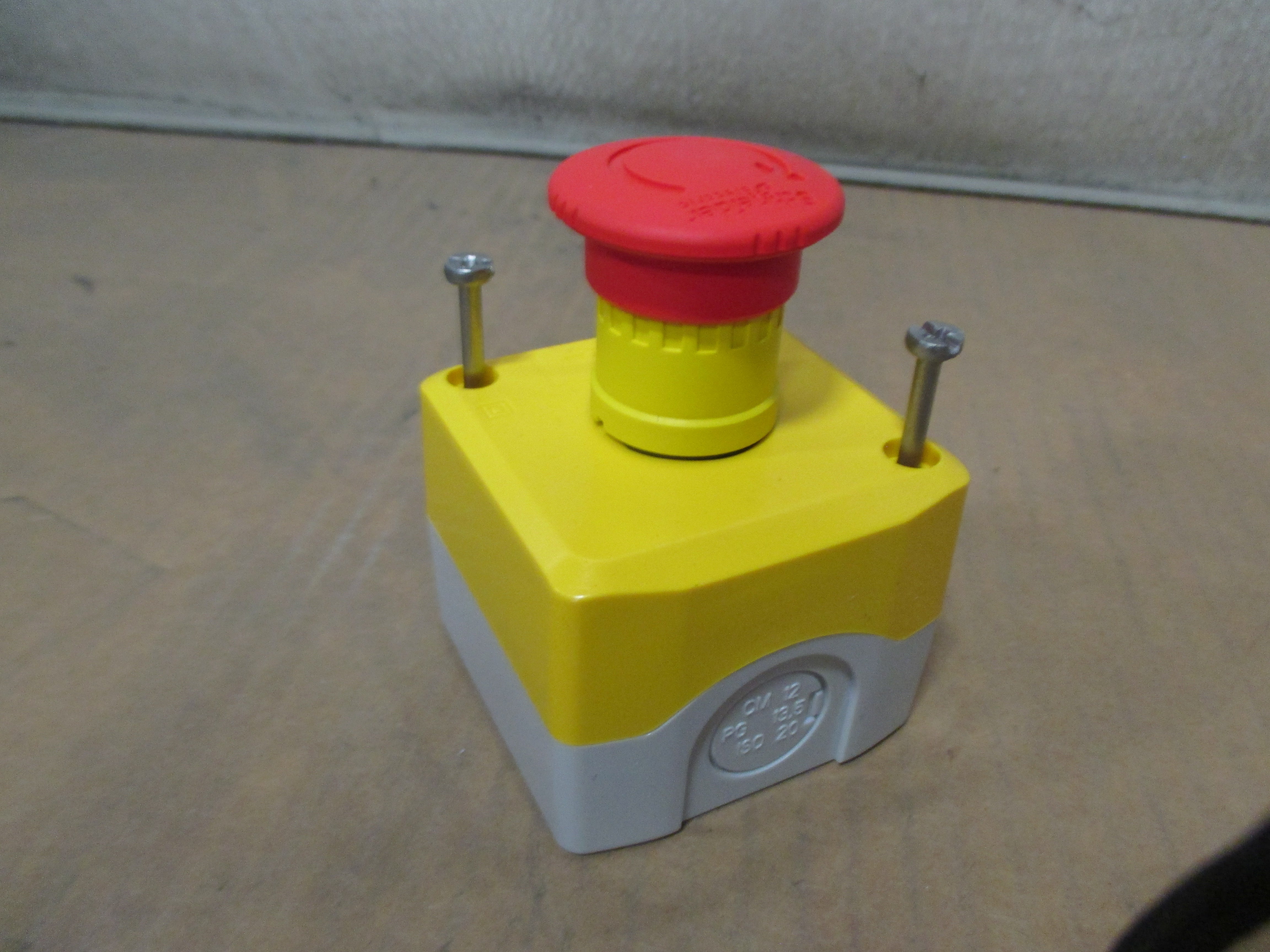 E STOP SWITCH, TURN TO RELEASE